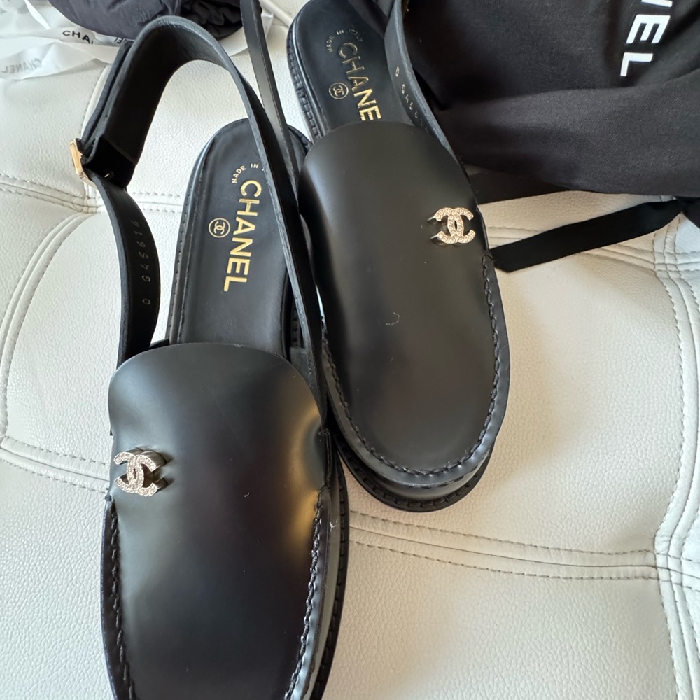 CHANEL Black Loafers with Silver Logo